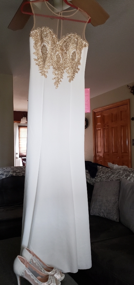 This is a baby online dress. It is a wedding and e